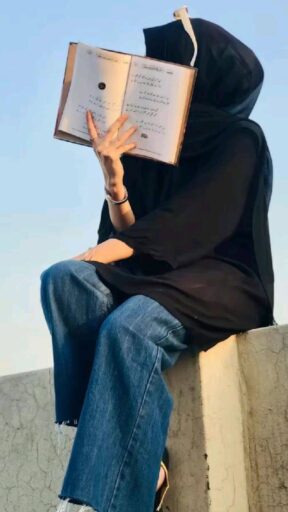 girl hidden face with book,girl in hijab,islamic girl pfp
