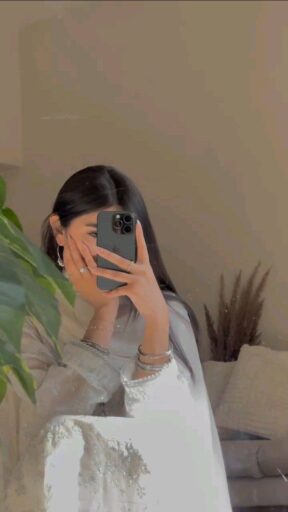 girl make her own photo with iphone phone dp