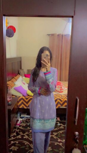 girl standing in mirror at her room near bed pic for social media