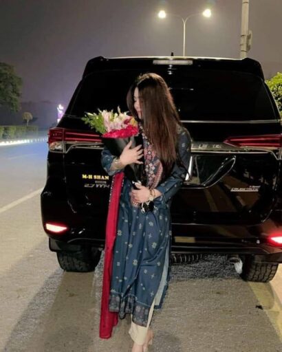 girl standing near her car dp girl with flower and car pic